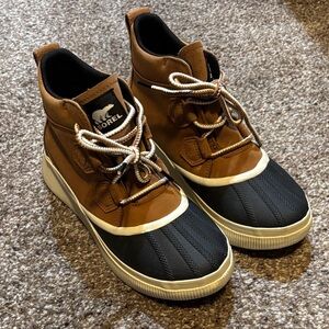 Sorel Tan and Black Winter Boots